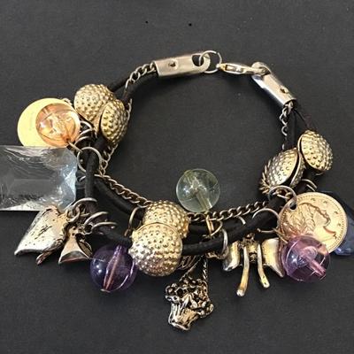 Gold tone, corded charm bracelet