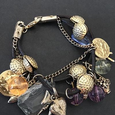 Gold tone, corded charm bracelet