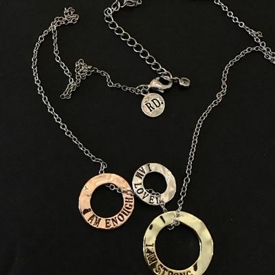 Beautiful, signed, rose, gold, toned, silver, and gold toned. I am strong I am loved. I am enough fashion necklace.