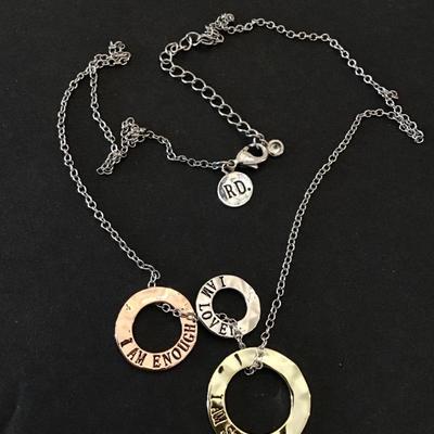 Beautiful, signed, rose, gold, toned, silver, and gold toned. I am strong I am loved. I am enough fashion necklace.