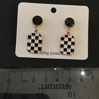 Cute, Gold tone, black, and white checkered earrings