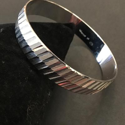 Vintage crown, Trifari etched design, silver toned bangle bracelet