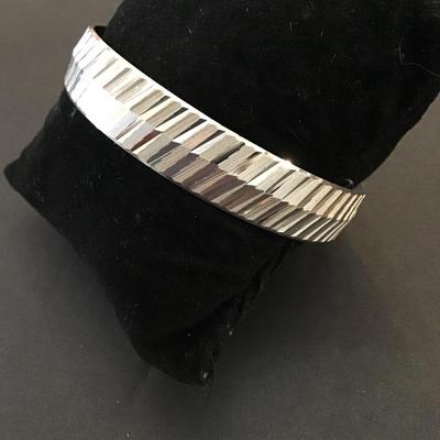 Vintage crown, Trifari etched design, silver toned bangle bracelet