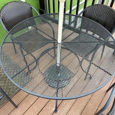 PATIO TABLE WITH UMBRELLA AND 4 CHAIRS