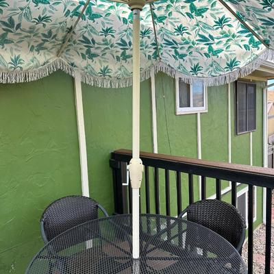 PATIO TABLE WITH UMBRELLA AND 4 CHAIRS