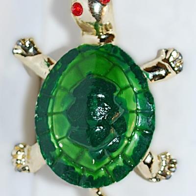 Small Green TURTLE BROOCH (1¼" x ¾") with Solid Green Shell and Red Eyes on a Gold Tone Setting