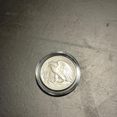 1928 SILVER STANDING LIBERTY QUARTER AND 1942 SILVER WALKING LIBERTY QUARTER