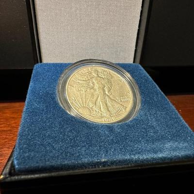 1928 SILVER STANDING LIBERTY QUARTER AND 1942 SILVER WALKING LIBERTY QUARTER