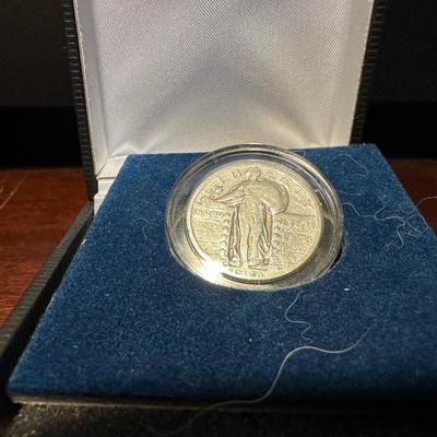 1928 SILVER STANDING LIBERTY QUARTER AND 1942 SILVER WALKING LIBERTY QUARTER