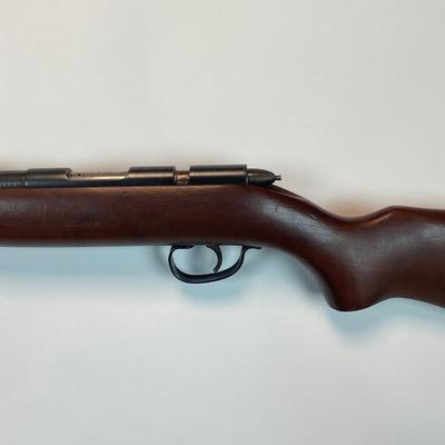 Sale Photo Thumbnail #33: Offered is a vintage Remington Model 512 The Sportmaster rimfire rifle — a classic mid-century bolt-action .22 with the original tubular magazine and traditional one-piece hardwood stock. The stamped barrel code LTT dates the barrel to Feb. 1948, placin