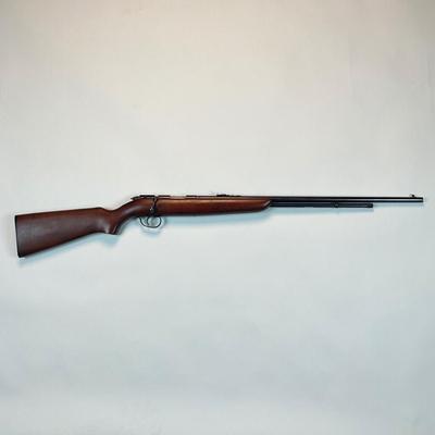 Sale Photo Thumbnail #24: Offered is a vintage Remington Model 512 The Sportmaster rimfire rifle — a classic mid-century bolt-action .22 with the original tubular magazine and traditional one-piece hardwood stock. The stamped barrel code LTT dates the barrel to Feb. 1948, placin