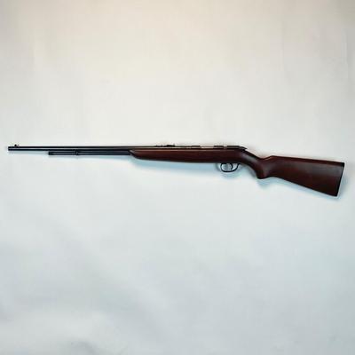 Sale Photo Thumbnail #29: Offered is a vintage Remington Model 512 The Sportmaster rimfire rifle — a classic mid-century bolt-action .22 with the original tubular magazine and traditional one-piece hardwood stock. The stamped barrel code LTT dates the barrel to Feb. 1948, placin