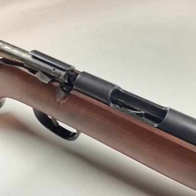 Sale Photo Thumbnail #45: Offered is a vintage Remington Model 512 The Sportmaster rimfire rifle — a classic mid-century bolt-action .22 with the original tubular magazine and traditional one-piece hardwood stock. The stamped barrel code LTT dates the barrel to Feb. 1948, placin