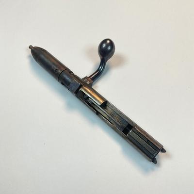 Sale Photo Thumbnail #38: Offered is a vintage Remington Model 512 The Sportmaster rimfire rifle — a classic mid-century bolt-action .22 with the original tubular magazine and traditional one-piece hardwood stock. The stamped barrel code LTT dates the barrel to Feb. 1948, placin