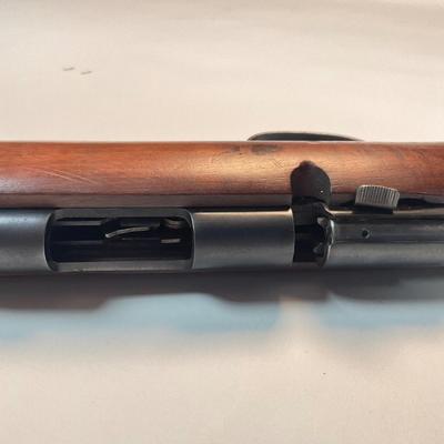 Sale Photo Thumbnail #41: Offered is a vintage Remington Model 512 The Sportmaster rimfire rifle — a classic mid-century bolt-action .22 with the original tubular magazine and traditional one-piece hardwood stock. The stamped barrel code LTT dates the barrel to Feb. 1948, placin
