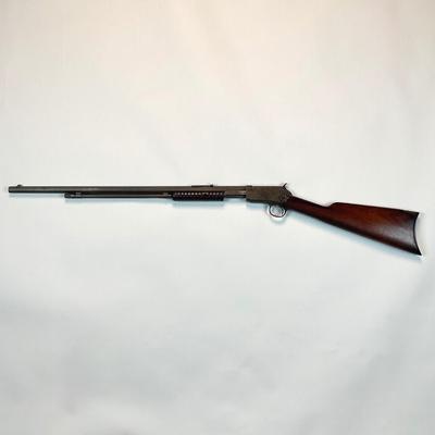 Sale Photo Thumbnail #61: Winchester’s legendary John & Matthew Browning–designed slide-action .22 rifle, prized by collectors and vintage-shooting enthusiasts alike. This late-production Model 1890 (often called the “Gallery Gun”) represents the final evolution of Winches