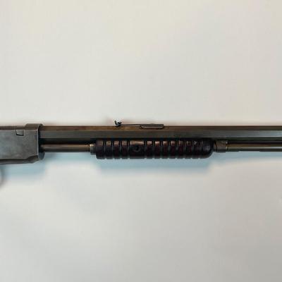 Sale Photo Thumbnail #56: Winchester’s legendary John & Matthew Browning–designed slide-action .22 rifle, prized by collectors and vintage-shooting enthusiasts alike. This late-production Model 1890 (often called the “Gallery Gun”) represents the final evolution of Winches