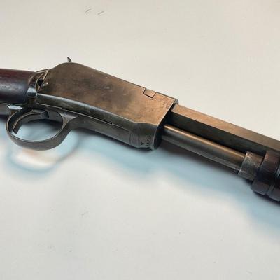 Sale Photo Thumbnail #66: Winchester’s legendary John & Matthew Browning–designed slide-action .22 rifle, prized by collectors and vintage-shooting enthusiasts alike. This late-production Model 1890 (often called the “Gallery Gun”) represents the final evolution of Winches