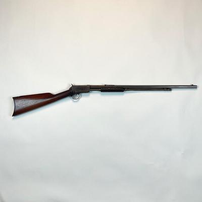 Sale Photo Thumbnail #53: Winchester’s legendary John & Matthew Browning–designed slide-action .22 rifle, prized by collectors and vintage-shooting enthusiasts alike. This late-production Model 1890 (often called the “Gallery Gun”) represents the final evolution of Winches