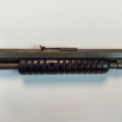 Sale Photo Thumbnail #58: Winchester’s legendary John & Matthew Browning–designed slide-action .22 rifle, prized by collectors and vintage-shooting enthusiasts alike. This late-production Model 1890 (often called the “Gallery Gun”) represents the final evolution of Winches