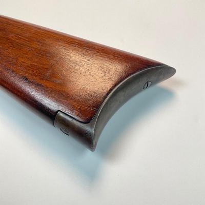 Sale Photo Thumbnail #60: Winchester’s legendary John & Matthew Browning–designed slide-action .22 rifle, prized by collectors and vintage-shooting enthusiasts alike. This late-production Model 1890 (often called the “Gallery Gun”) represents the final evolution of Winches