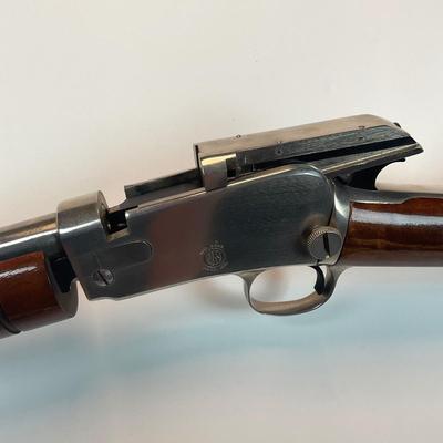 Sale Photo Thumbnail #114: Offered is a Rossi Model 62 SA Stainless Steel Pump-Action Rifle chambered in .22 Long Rifle, serial G240165 — a modern Brazilian reproduction of the legendary Winchester Model 62 “gallery gun.” This stainless Rossi captures the timeless design, smo