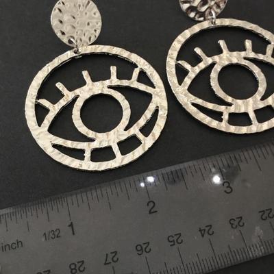 Large silver toned, all seeing eye, evil eye, statement earrings