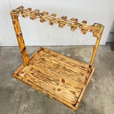 Sale Photo Thumbnail #145: Free-standing wooden gun rack, designed for storing and displaying long guns such as rifles and shotguns. It has "WINCHESTER" & “Remington” logos on the front.
Made from pine. 
It is designed to be a portable, floor-standing storage solution, suitable
