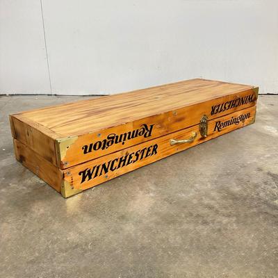 Sale Photo Thumbnail #147: Free-standing wooden gun rack, designed for storing and displaying long guns such as rifles and shotguns. It has "WINCHESTER" & “Remington” logos on the front.
Made from pine. 
It is designed to be a portable, floor-standing storage solution, suitable