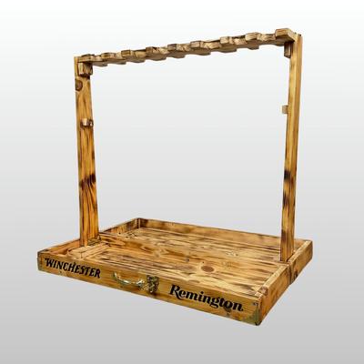 Sale Photo Thumbnail #144: Free-standing wooden gun rack, designed for storing and displaying long guns such as rifles and shotguns. It has "WINCHESTER" & “Remington” logos on the front.
Made from pine. 
It is designed to be a portable, floor-standing storage solution, suitable