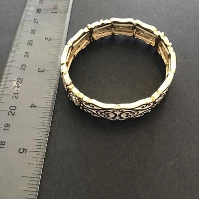 Gold tone white enamel stretchy bracelet