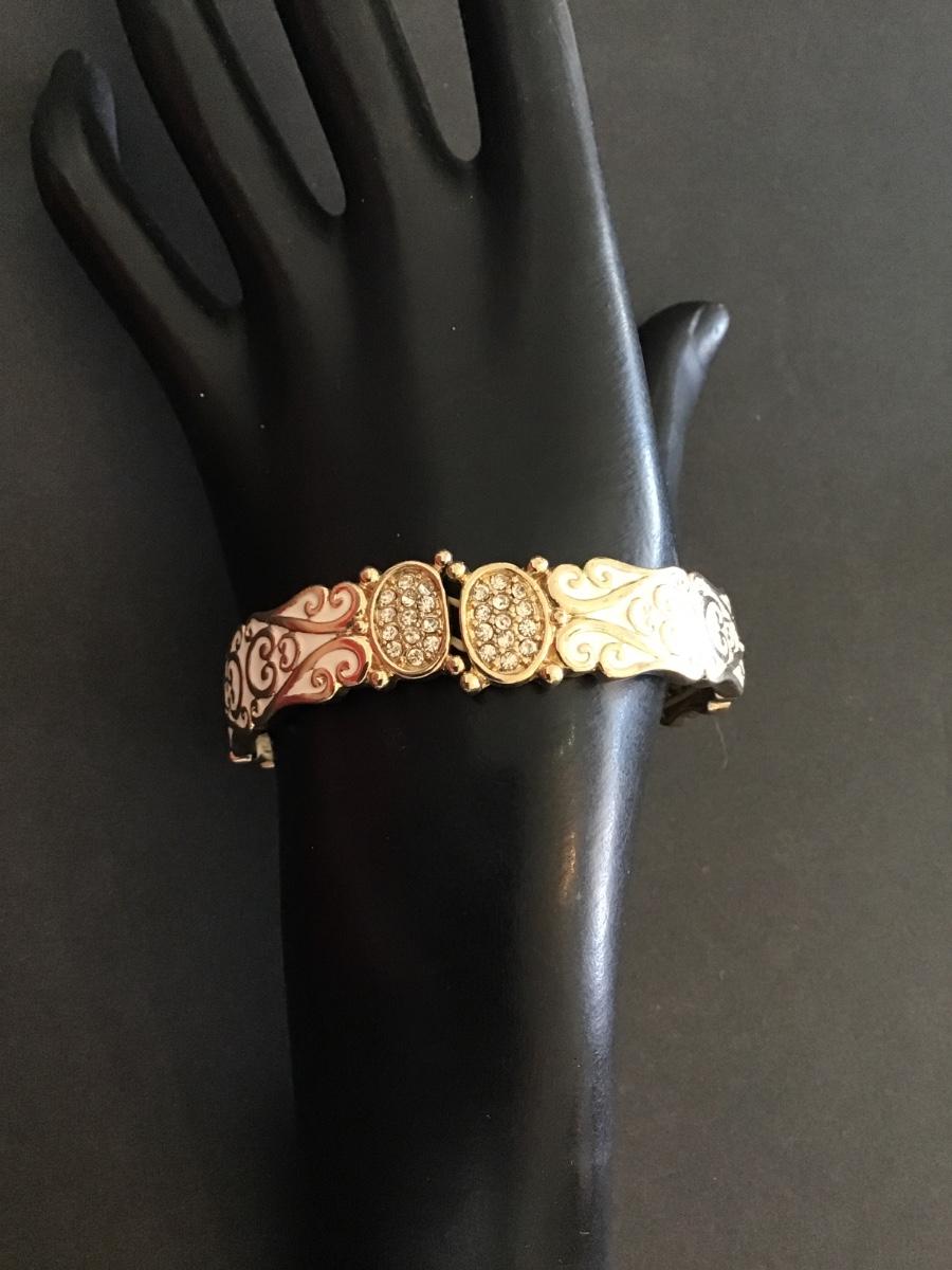 Sale Photo Thumbnail #188: Gold tone white enameled stretchy bracelet 
Please see attached photos
