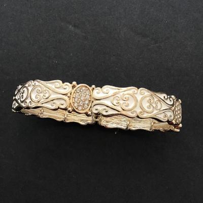 Gold tone white enamel stretchy bracelet