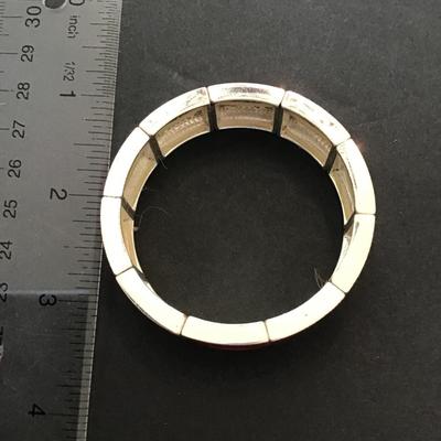 Very nice gold tone with Red enamel stretchy bracelet