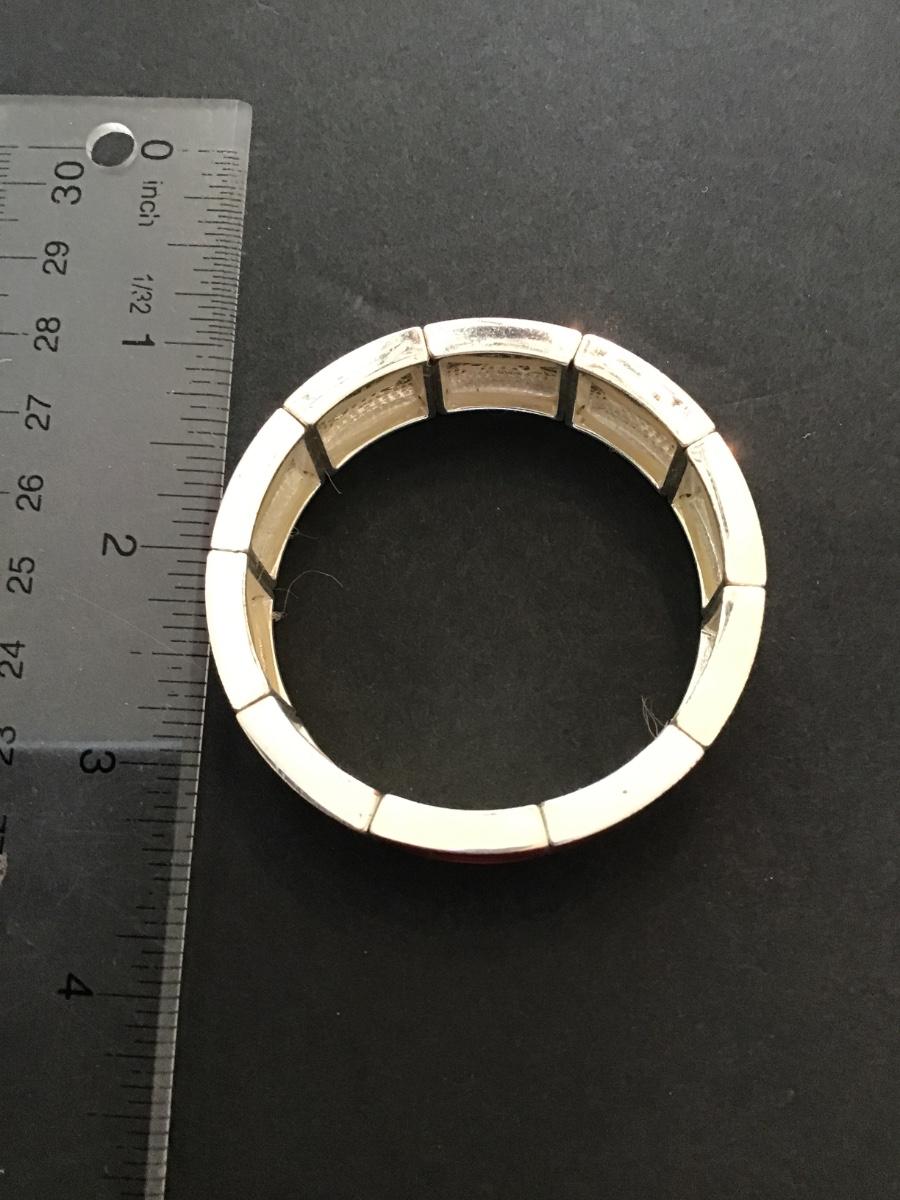 Sale Photo Thumbnail #205: Very nice gold tone with red Enamel stretchy bracelet. Please see attached photos.