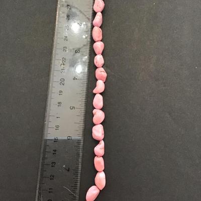 Very nice pink polished rock bracelet