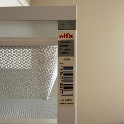 Two White Elfa Mesh Closet Organizers