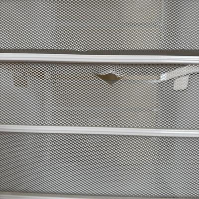 Two White Elfa Mesh Closet Organizers