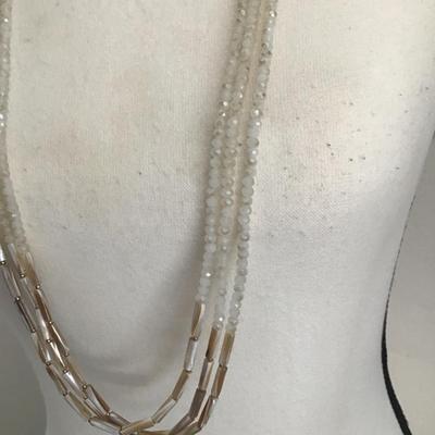 Beautiful, multi strand beaded necklace with mother of pearl, silver white glass Beads