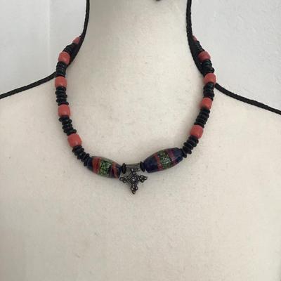 Beautiful vintage, handcrafted necklace with glass, beads and metal charm