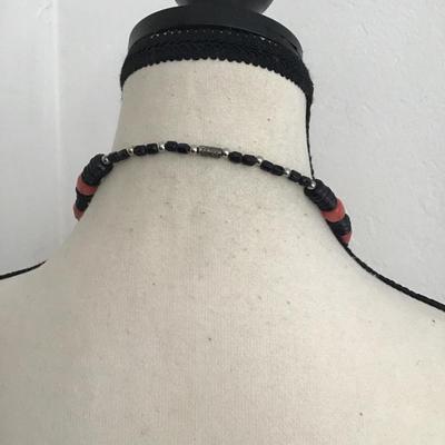 Beautiful vintage, handcrafted necklace with glass, beads and metal charm