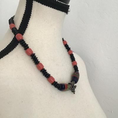Beautiful vintage, handcrafted necklace with glass, beads and metal charm