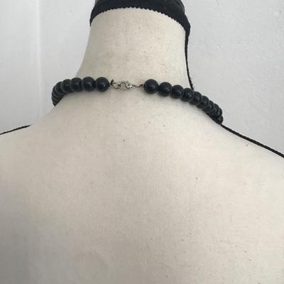 Beautiful, black and white faux beaded necklace with zebra pendant