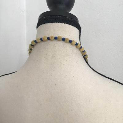 Beautiful, vintage hand, carved pikake flower, celluloid roses with blue polished stones necklace