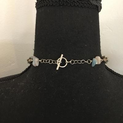 Beautiful gemstone and Silvertone toggle necklace. Healing stone necklace. Very nice very beautiful.