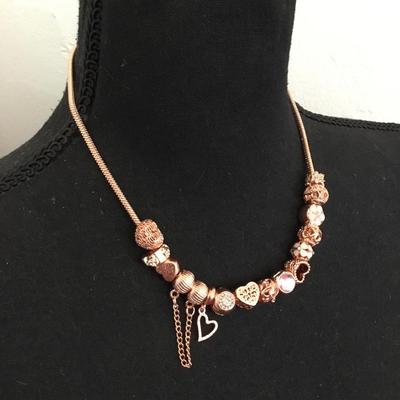 Beautiful very nice rose gold, toned, enamel charm and rhinestone charm heart necklace, charm beads