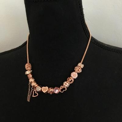 Beautiful very nice rose gold, toned, enamel charm and rhinestone charm heart necklace, charm beads