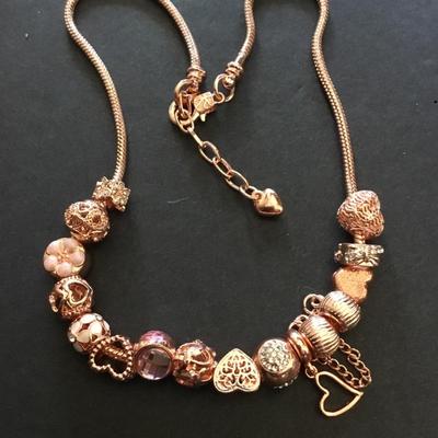 Beautiful very nice rose gold, toned, enamel charm and rhinestone charm heart necklace, charm beads