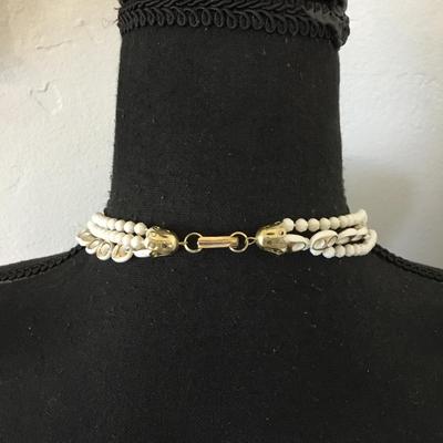 Beautiful, vintage white and gold tone Multi strand, bead, flapper style necklace