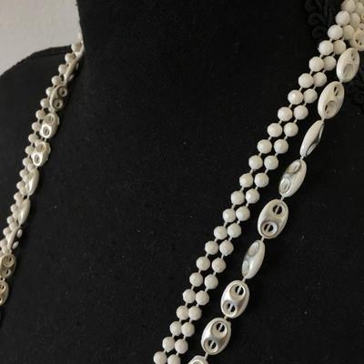 Beautiful, vintage white and gold tone Multi strand, bead, flapper style necklace